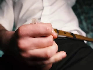 Sexy alms-man in a lodge jerks off close-up&comma; moans with pleasure and cums in a condom&period;